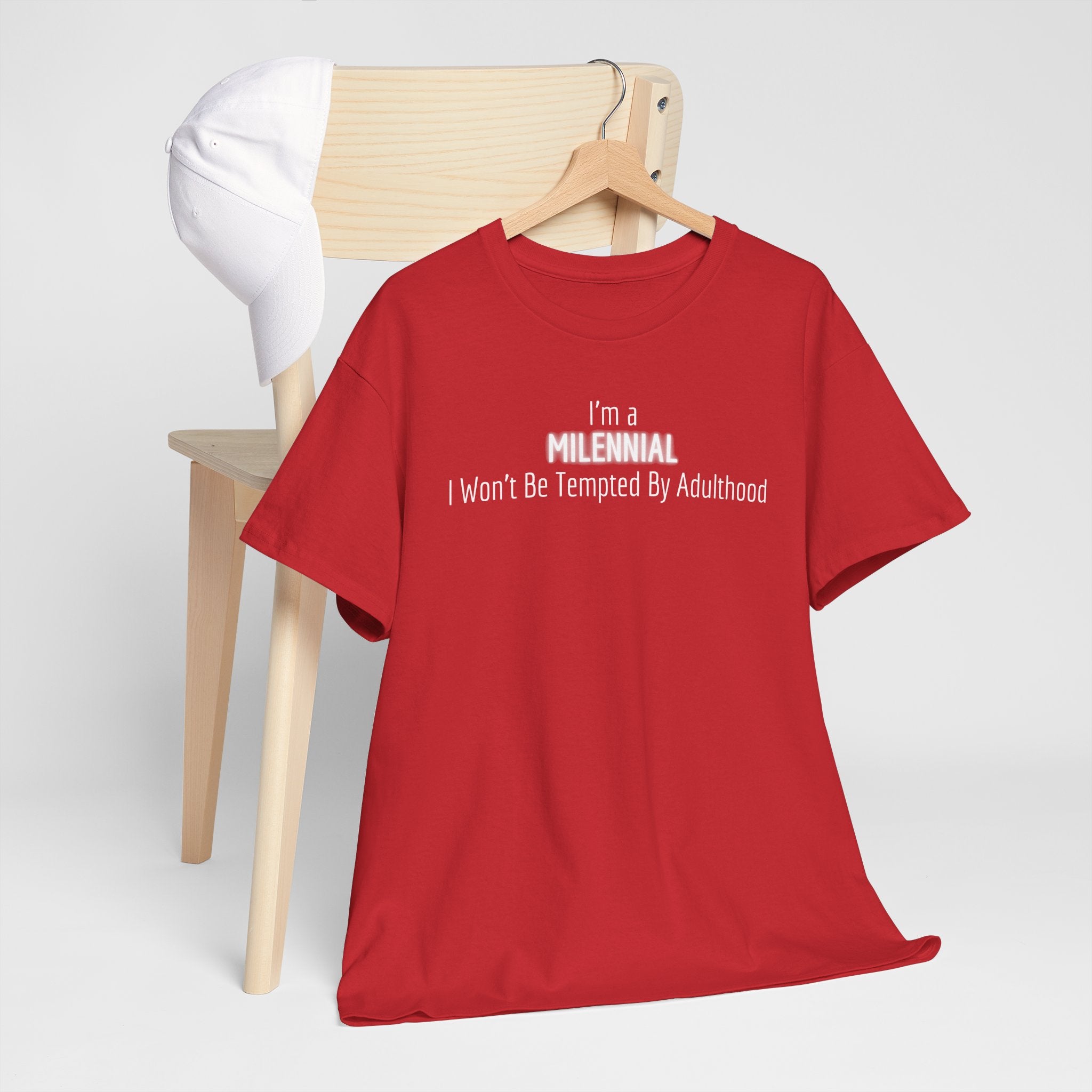 Millennial Tee — "I’m a Millennial, I Won’t Be Tempted By Adulthood" Funny Graphic T-Shirt