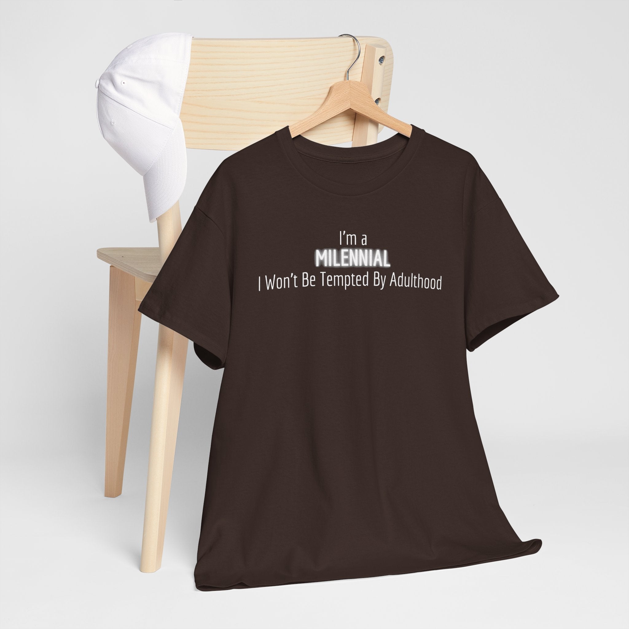 Millennial Tee — "I’m a Millennial, I Won’t Be Tempted By Adulthood" Funny Graphic T-Shirt